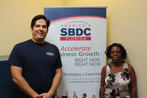 Daniel Quiroz (left), Owner of Delivery Signs, worked with consultant Pauline Davis from the Florida SBDC at UCF to secure an emergency bridge loan for the business following Hurricane Irma.